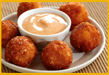 Bacon and Potato Fritters with Spiced Honey Creme Fraiche Sauce